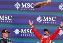 El piloto británico Lewis Hamilton celebra tras conseguir su primera victoria con Ferrari en el Gran Premio de Barcelona